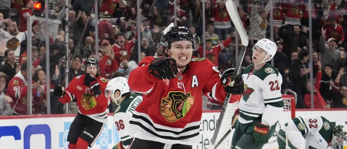 Chicago Blackhawks center Connor Bedard (98) celebrates his gaol against the Minnesota Wild during the second period at United Center.