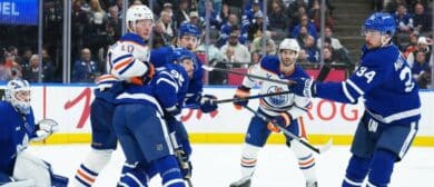 Toronto Maple Leafs center Auston Matthews (34) controls the puck with his stick against the Edmonton Oilers during the second period at Scotiabank Arena