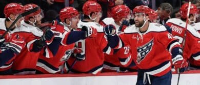 Washington Capitals right wing Tom Wilson (43) celebrates with teammates after scoring a goal against the New York Rangers during the second period at Capital One Arena