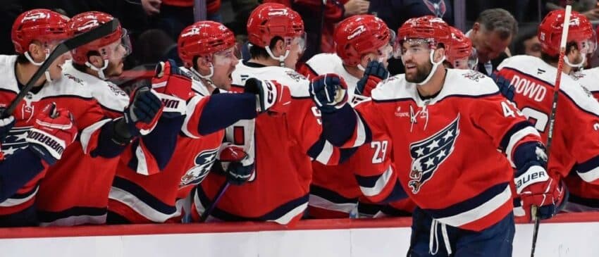 Washington Capitals right wing Tom Wilson (43) celebrates with teammates after scoring a goal against the New York Rangers during the second period at Capital One Arena