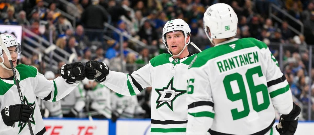 Dallas Stars defenseman Thomas Harley (55) is congratulated by center Wyatt Johnston (53) and right wing Mikko Rantanen (96) after scoring the game winning goal against the St. Louis Blues during the third period at Enterprise Center.