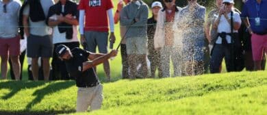Max Homa plays a shot from a bunker on the first hole during the first round of the Farmers Insurance Open golf tournament at Torrey Pines Municipal Golf Course - South Course.