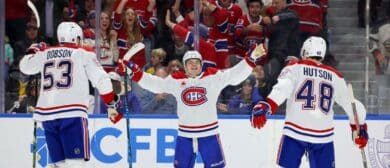 Montréal Canadiens right wing Cole Caufield (13) reacts after scoring a goal during the third period against the Buffalo Sabres at KeyBank Center