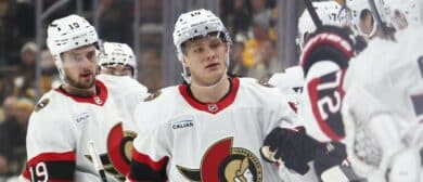 Ottawa Senators center Tim Stutzle (18) celebrates with the bench after scoring a goal against the Pittsburgh Penguins during the third period at PPG Paints Arena