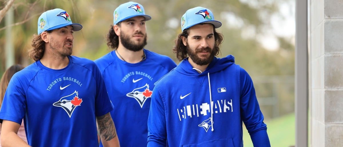 Toronto Blue Jays pitcher Kevin Gausman (34), pitcher Dylan Cease (84), pitcher Cody Ponce (37) workout for spring training practice at Blue Jays Player Development Complex