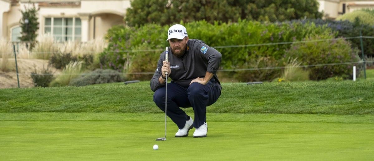 Shane Lowry lines up his putt on the second hole during the final round of the AT&T Pebble Beach Pro-Am golf tournament at Pebble Beach Golf Links