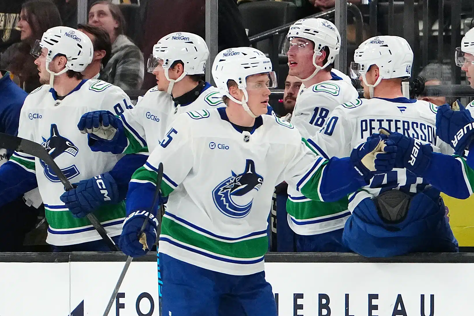 Feb 4, 2026; Las Vegas, Nevada, USA; Vancouver Canucks defenseman Elias Pettersson (25) celebrates after scoring a goal against the Vegas Golden Knights during the second period at T-Mobile Arena.