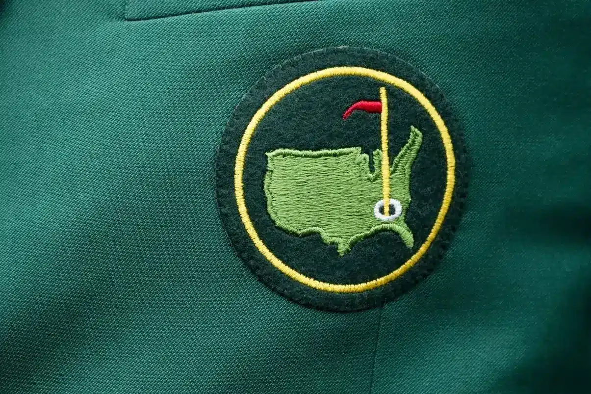 A logo adorns a member's jacket during a practice round for The Masters golf tournament at the Augusta National Golf Club in Augusta, Ga., on April 3, 2023.