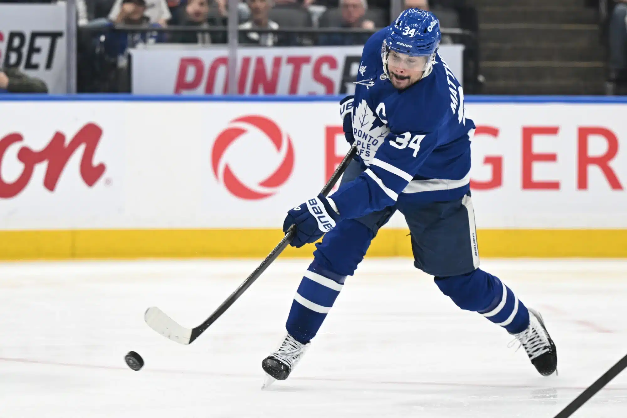 Mar 7, 2026; Toronto, Ontario, CAN; Toronto Maple Leafs forward Auston Matthews (34) shoots the puck against the Tampa Bay Lightning in the third period at Scotiabank Arena.