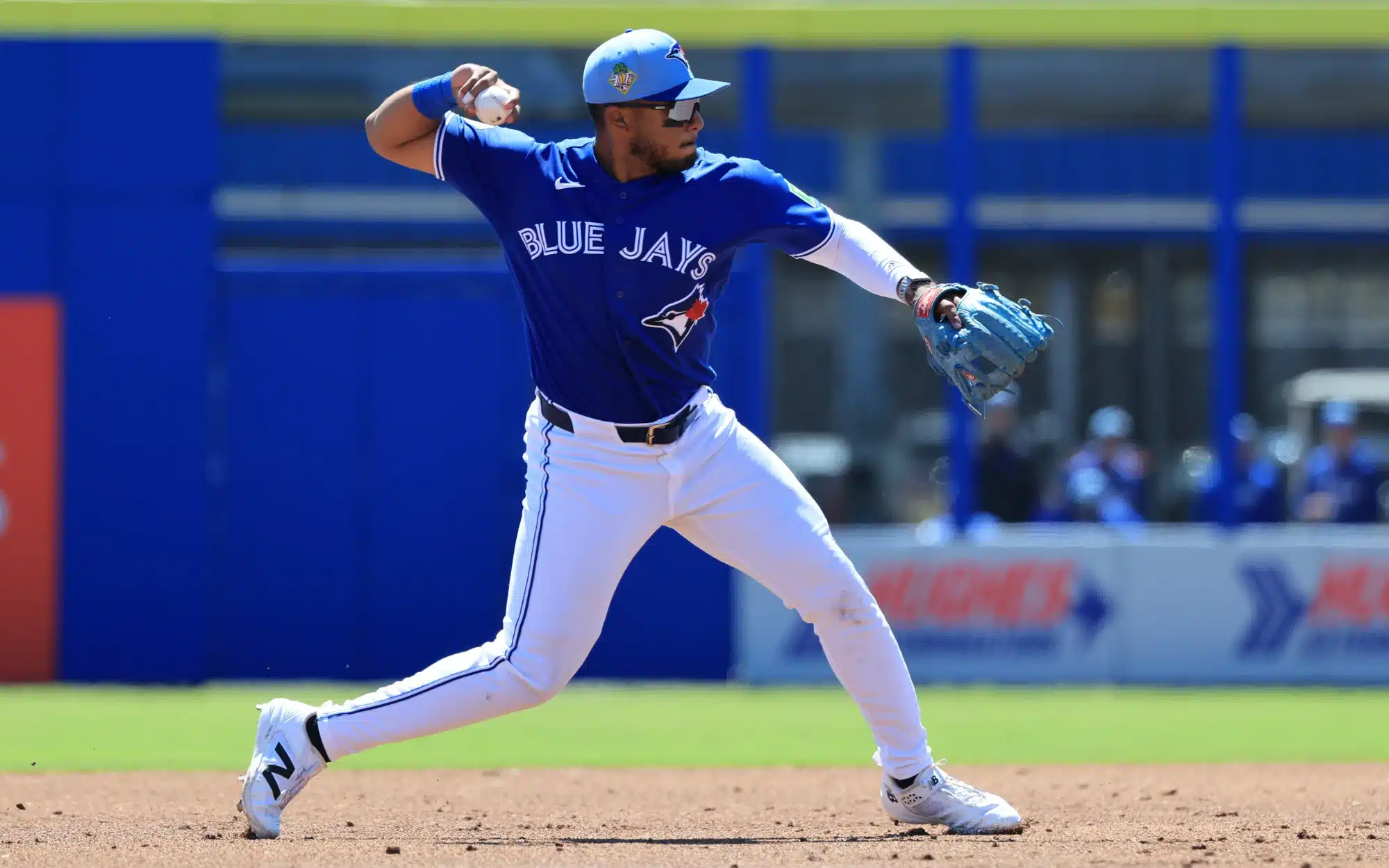 Mar 18, 2026; Dunedin, Florida, USA; Toronto Blue Jays shortstop Leo Jimenez (49) throws the ball to first base for an out during the second inning against the Baltimore Orioles at TD Ballpark. 