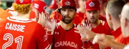 Mar 15, 2023; Phoenix, Arizona, USA; Canada infielder Edouard Julien celebrates with teammates after hitting a seventh inning home run against Mexico during the World Baseball Classic at Chase Field.