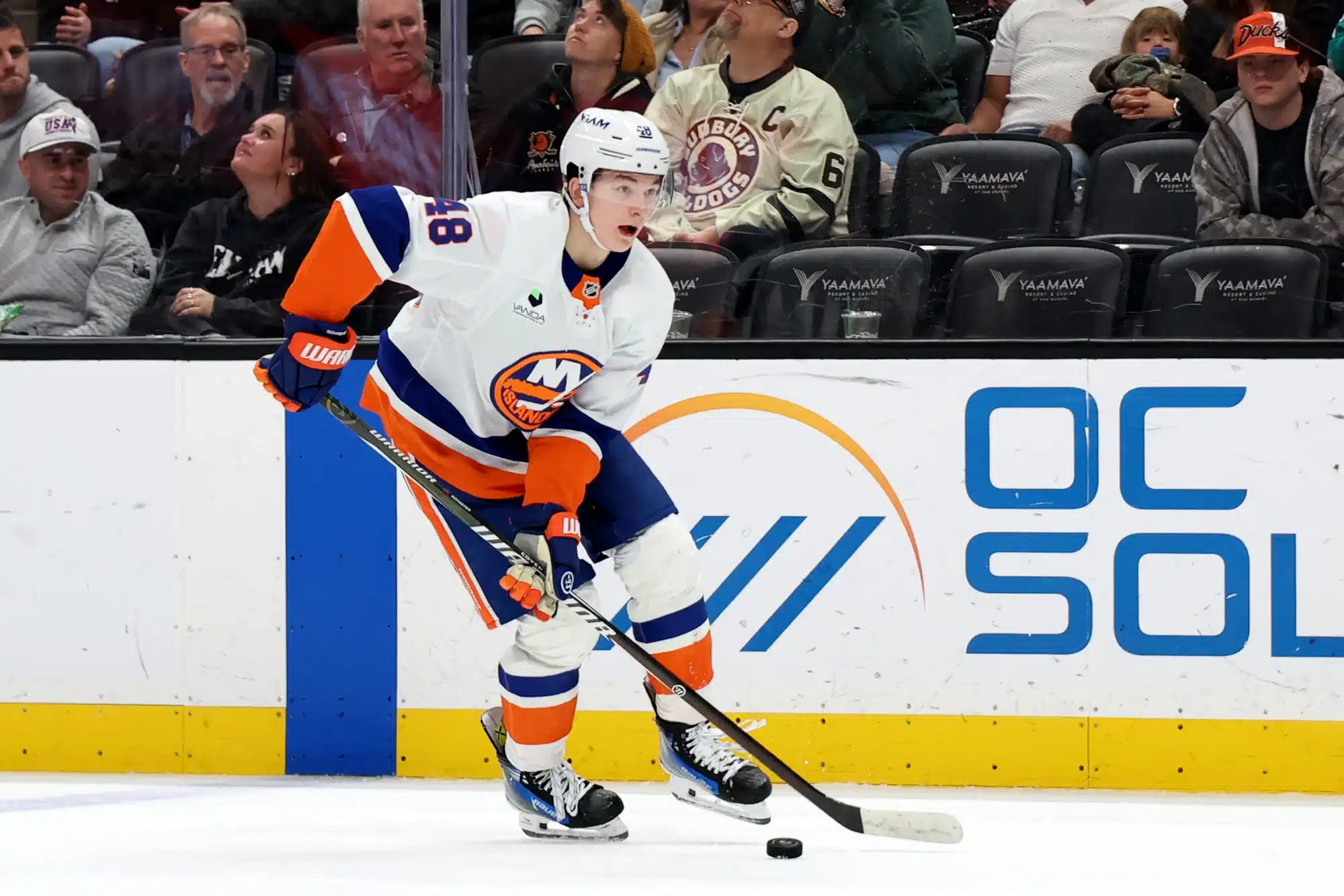 Mar 4, 2026; Anaheim, California, USA; New York Islanders defenseman Matthew Schaefer (48) skates with the puck during the third period against the Anaheim Ducks at Honda Center. 