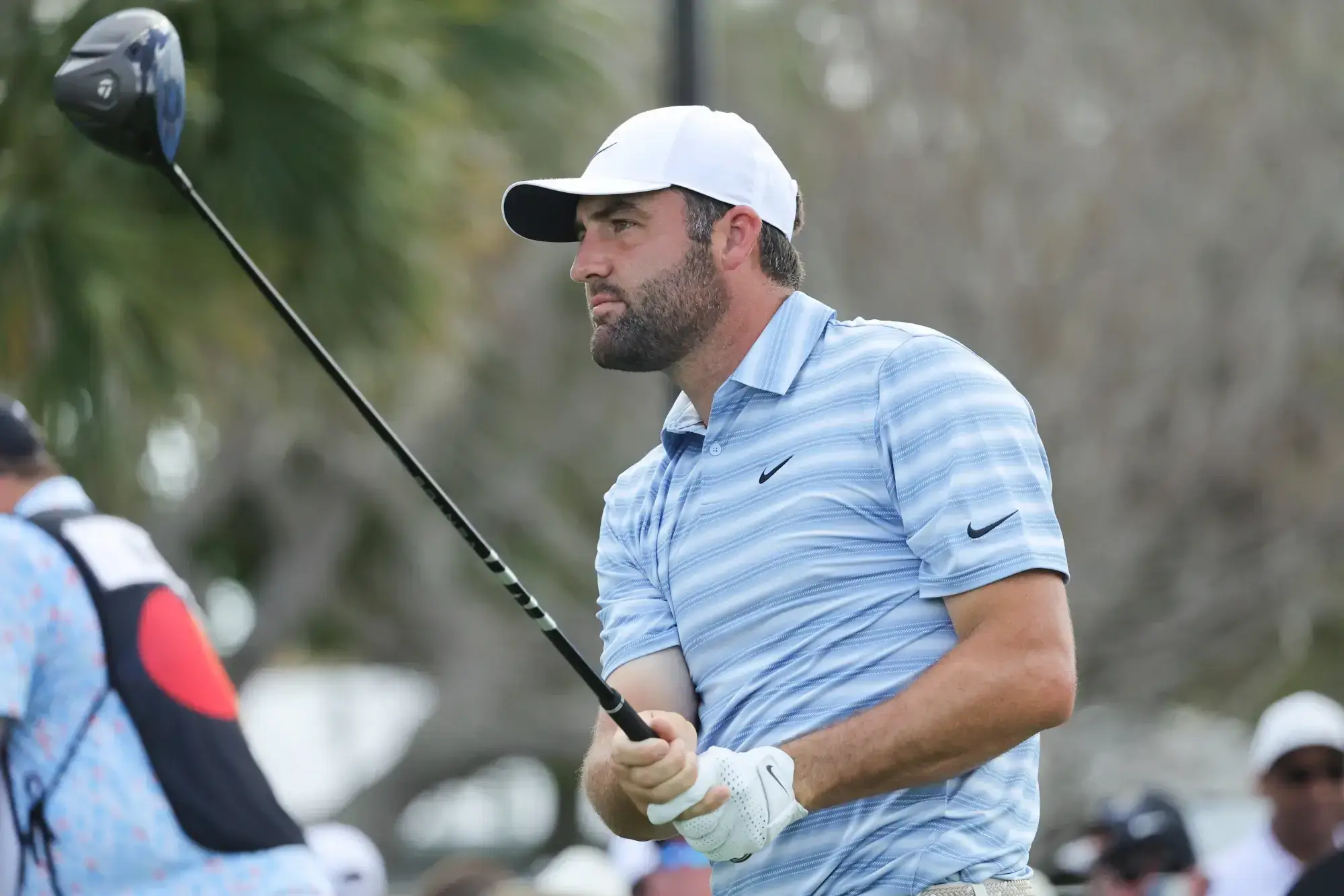 Mar 8, 2026; Orlando, Florida, USA; Scottie Scheffler plays his shot from the tenth tee during the final round of the Arnold Palmer Invitational golf tournament.