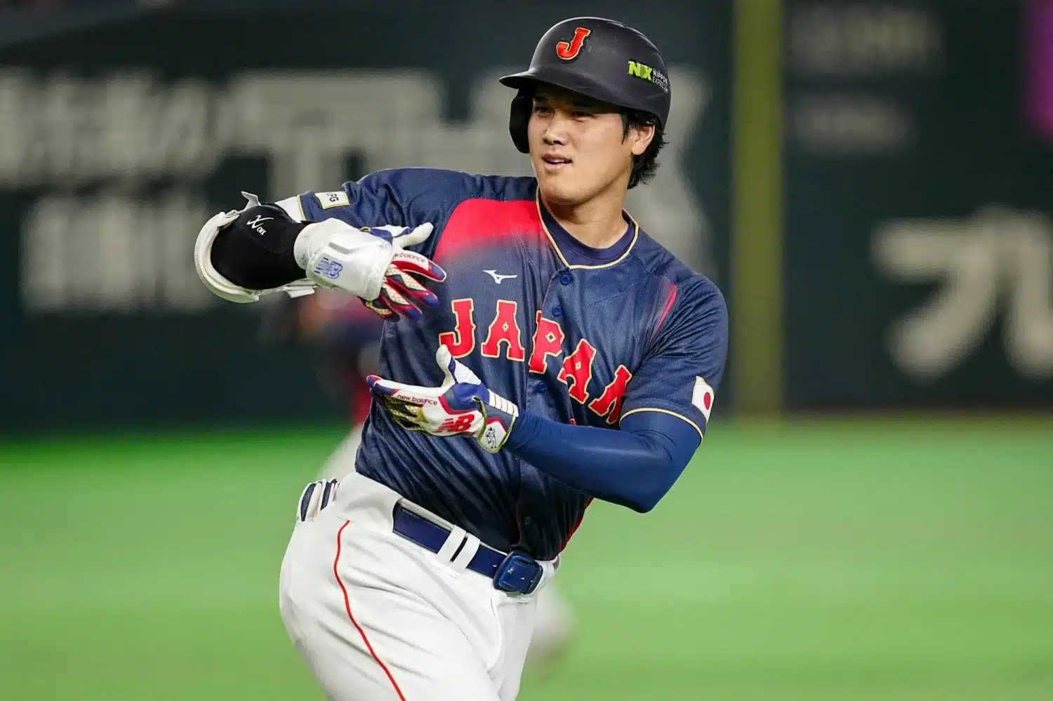 Shohei Ohtani celebrates after hitting a grand slam against Taiwan during the 2026 World Baseball Classic in Tokyo, Japan.