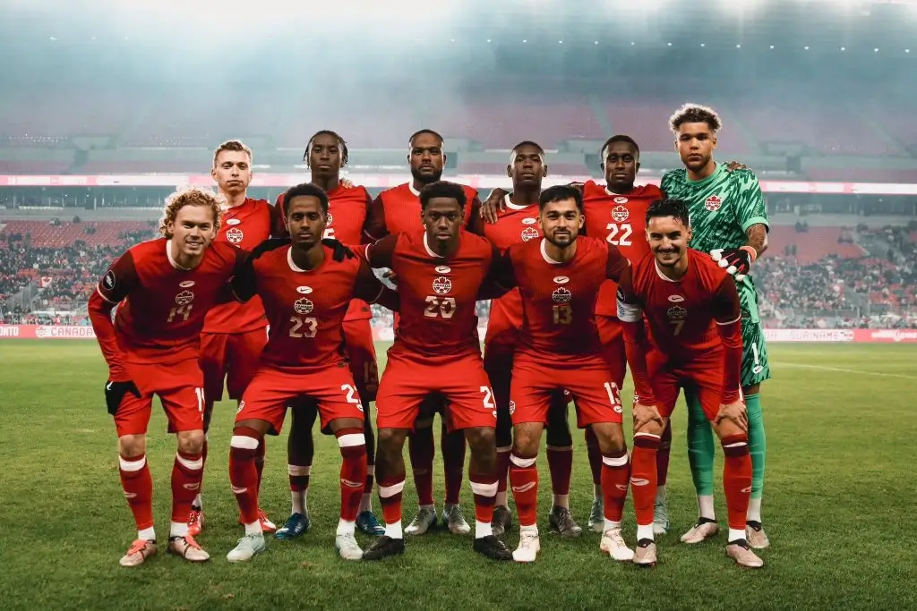 The Canadian men's national soccer team poses for a photo before a match in 2025.