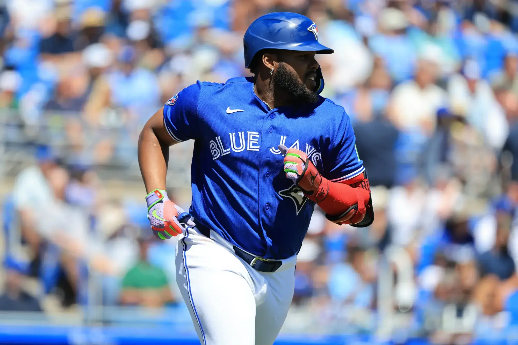Mar 19, 2026; Dunedin, Florida, USA; Toronto Blue Jays first baseman Vladimir Guerrero Jr. (27) singles during the fourth inning against the New York Yankees at TD Ballpark.
