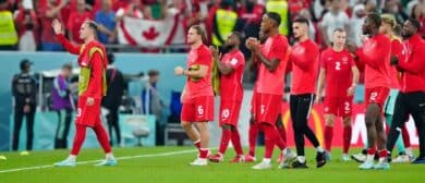 Canada acknowledges fans after losing a group stage match against Morocco during the 2022 World Cup at Al Thumama Stadium.