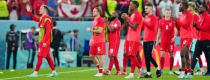 Canada acknowledges fans after losing a group stage match against Morocco during the 2022 World Cup at Al Thumama Stadium.