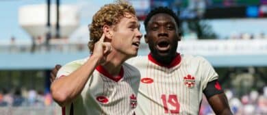 Canada forward Jacob Shaffelburg (14) celebrates with defender Alphonso Davies (19) after scoring a goal during the first half against the United States at Children’s Mercy Park