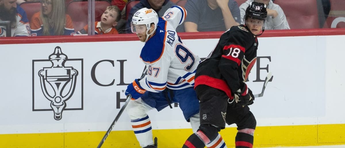 Edmonton Oilers center Connor McDavid ((7) skates past Ottawa Senators center Tim Stutzle (18) as he moves the puck in the third period at the Canadian Tire Centre.