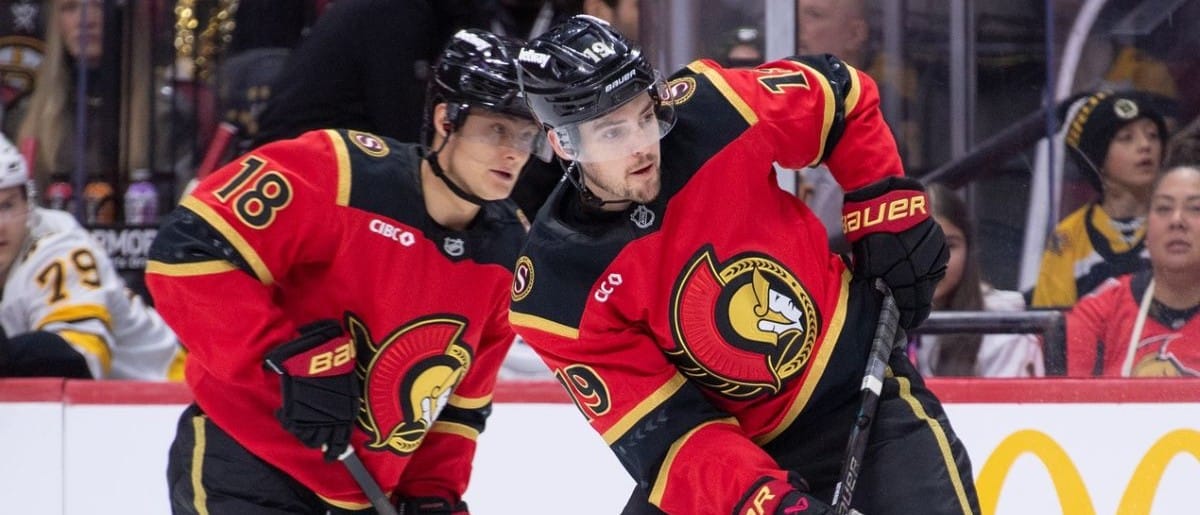 Ottawa Senators center Tim Stutzle (18) and right wing Drake Batherson (19) follow the puck in the first period against the Boston Bruins at the Canadian Tire Centre