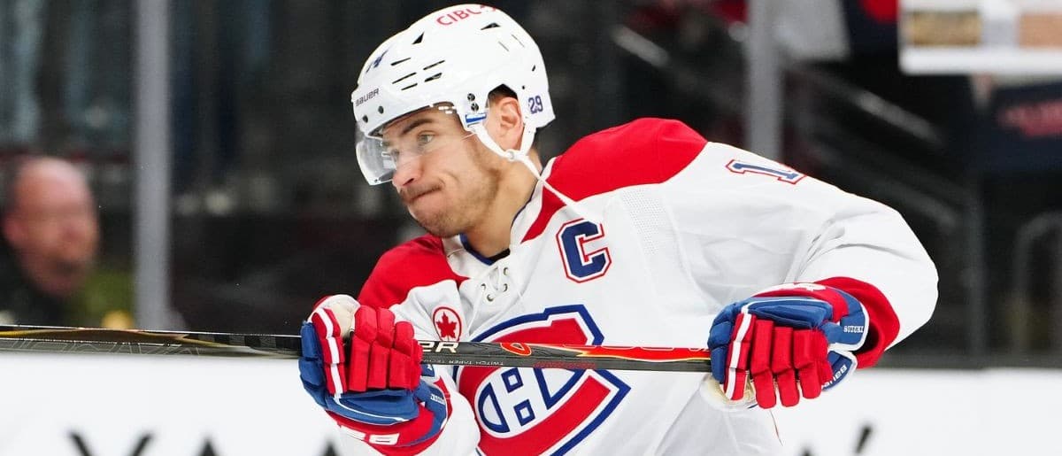 MontrÈal Canadiens center Nick Suzuki (14) warms up before a game against the Vegas Golden Knights at T-Mobile Arena