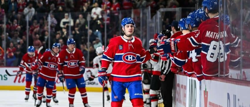 Montreal Canadiens left wing Juraj Slafkovsky (20) celebrates his goal against the Ottawa Senators with his teammates at the bench during the first period at Bell Centre
