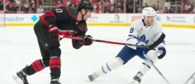 Carolina Hurricanes right wing Andrei Svechnikov (37) gets the shot past Toronto Maple Leafs center Steven Lorentz (18) during the third period at Lenovo Center