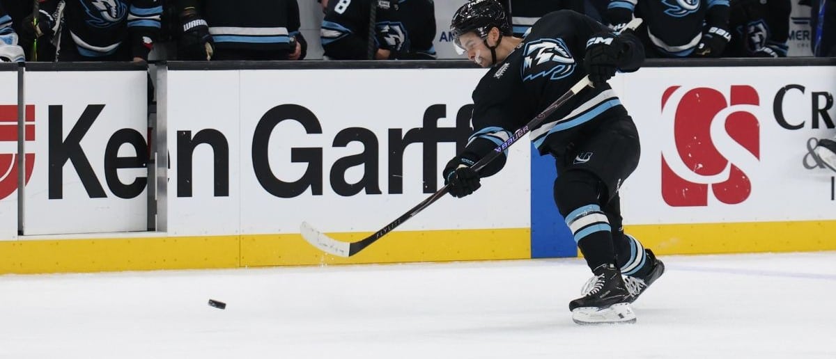Utah Mammoth right wing Dylan Guenther (11) takes a shot against the Dallas Stars during the second period at Delta Center