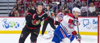 Ottawa Senators left wing Brady Tkachuk (7) and Montreal Canadiens defenseman Mike Matheson (8) chase the puck in the first period at the Canadian Tire Centre