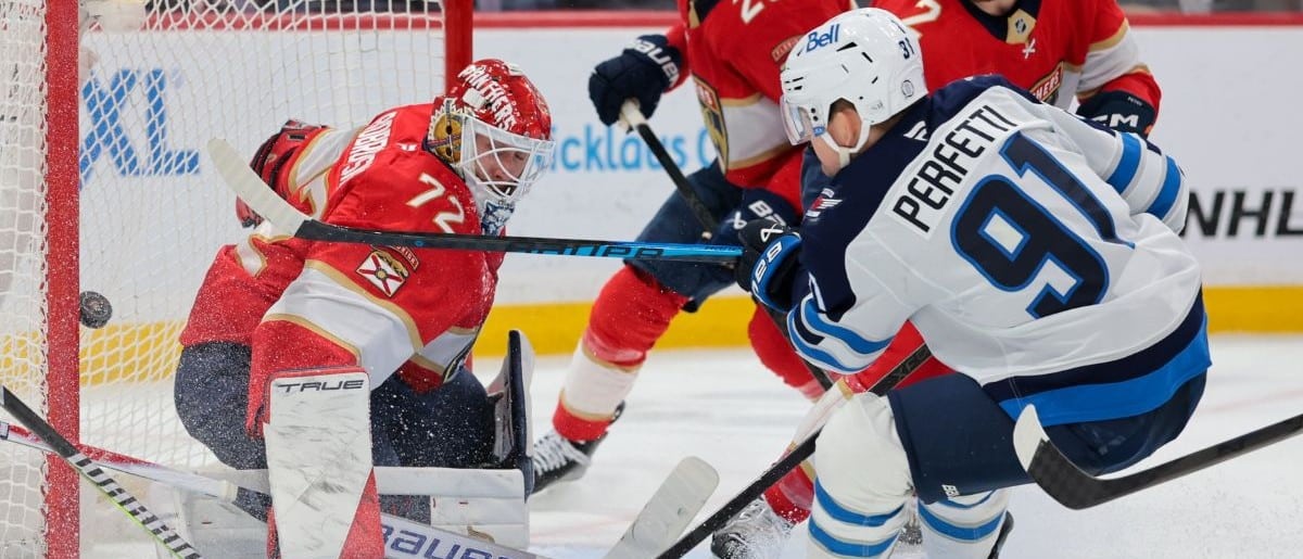 Winnipeg Jets center Cole Perfetti (91) scores against Florida Panthers goaltender Sergei Bobrovsky (72) during the third period at Amerant Bank Arena
