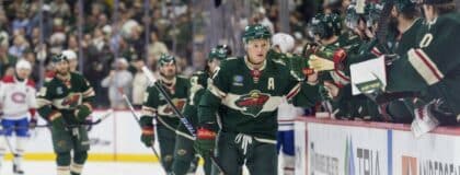 Minnesota Wild left wing Kirill Kaprizov (97) is congratulated by the bench after scoring on the Montreal Canadiens in the first period at Grand Casino Arena