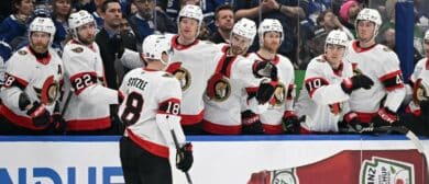 Ottawa Senators forward Tim Stutzle (18) celebrates with team mates at the bench after scoring a goal against the Toronto Maple Leafs in the second period at Scotiabank Arena.
