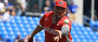 Canada infielder Josh Naylor (12) throws the ball to first base for an out during the first inning against the Toronto Blue Jays at TD Ballpark