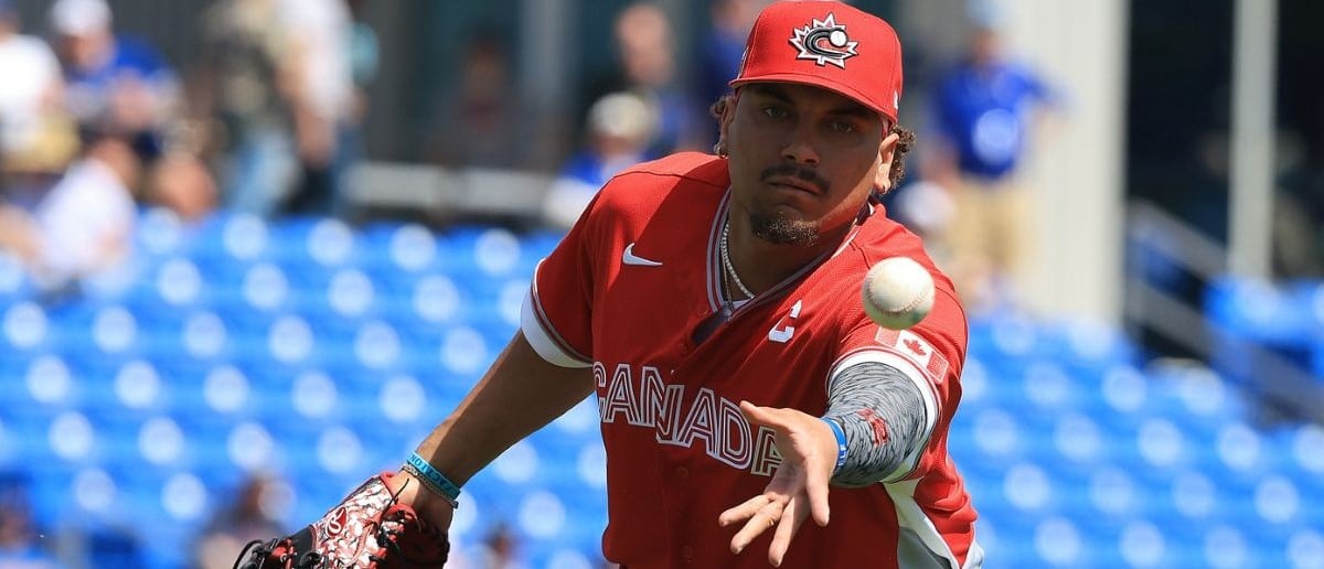 Canada infielder Josh Naylor (12) throws the ball to first base for an out during the first inning against the Toronto Blue Jays at TD Ballpark