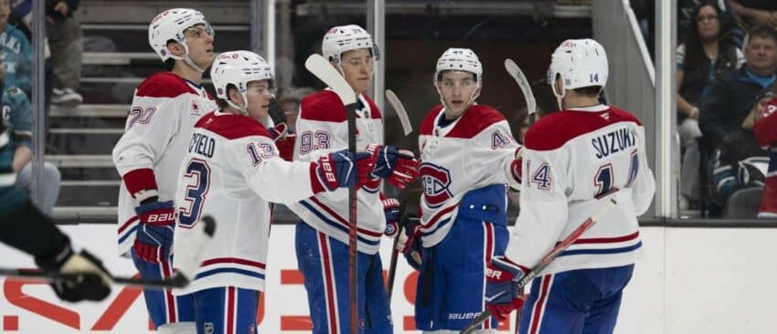 Montreal Canadiens right wing Cole Caufield (13) , left wing Juraj Slafkovský (20) , right wing Ivan Demidov (93) defenseman Lane Hutson (48) and center Nick Suzuki (14) celebrate after scoring a goal during the third period against the San Jose Sharks at SAP Center at San Jose.