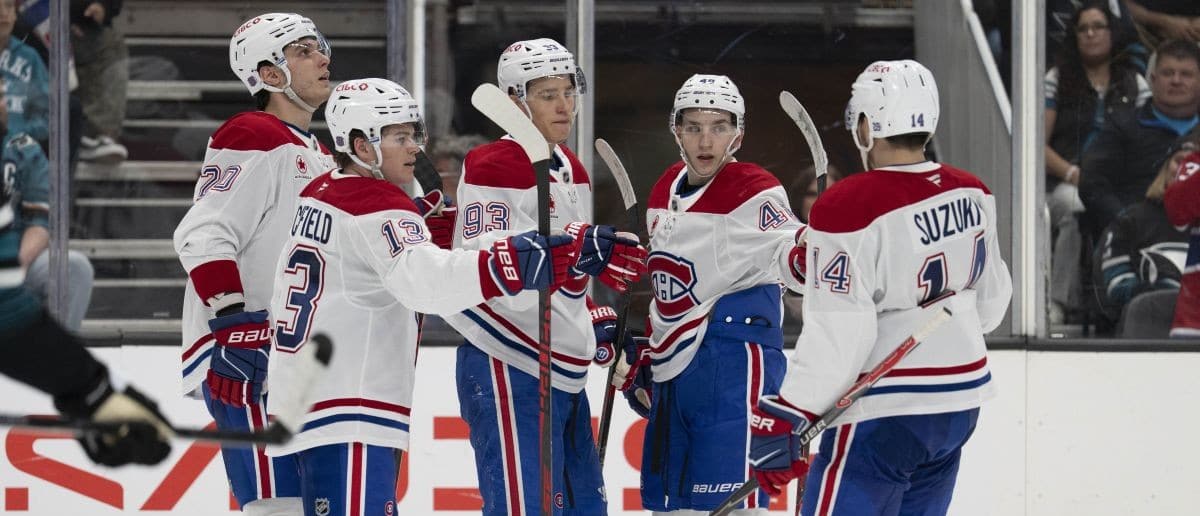 Montreal Canadiens right wing Cole Caufield (13) , left wing Juraj Slafkovský (20) , right wing Ivan Demidov (93) defenseman Lane Hutson (48) and center Nick Suzuki (14) celebrate after scoring a goal during the third period against the San Jose Sharks at SAP Center at San Jose.
