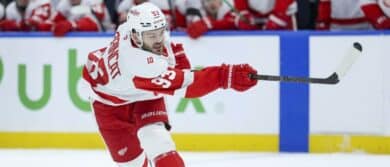 Detroit Red Wings right wing Alex DeBrincat (93) shoots the puck against the Tampa Bay Lightning in the second period at Benchmark International Arena.