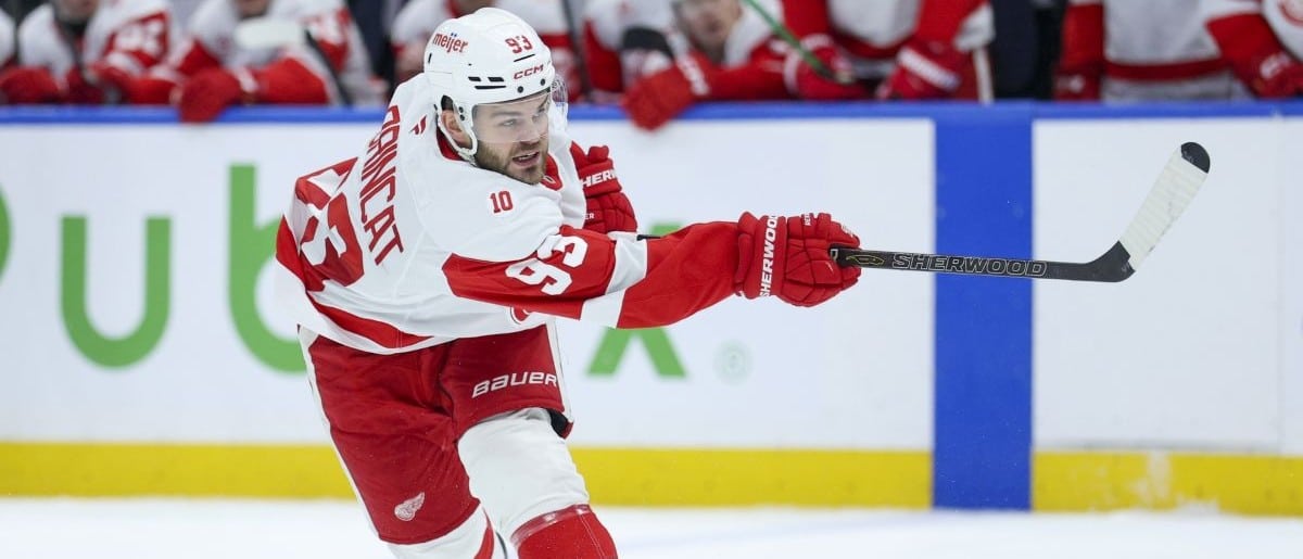 Detroit Red Wings right wing Alex DeBrincat (93) shoots the puck against the Tampa Bay Lightning in the second period at Benchmark International Arena.