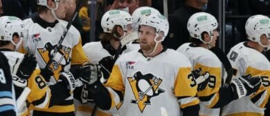 The Pittsburgh Penguins celebrate a goal by right wing Anthony Mantha (39) during the second period of a game against the Utah Mammoth at Delta Center