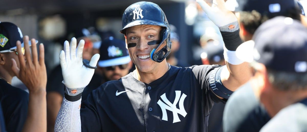 New York Yankees right fielder Aaron Judge (99) is congratulated after he hit a home run during the fifth inning against the Philadelphia Phillies at George M. Steinbrenner Field