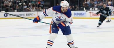 Edmonton Oilers defenseman Evan Bouchard (2) shoots against the Utah Mammoth during the second period at Delta Center
