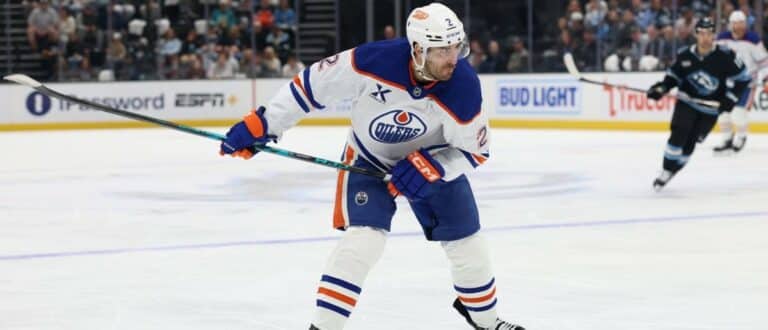 Edmonton Oilers defenseman Evan Bouchard (2) shoots against the Utah Mammoth during the second period at Delta Center
