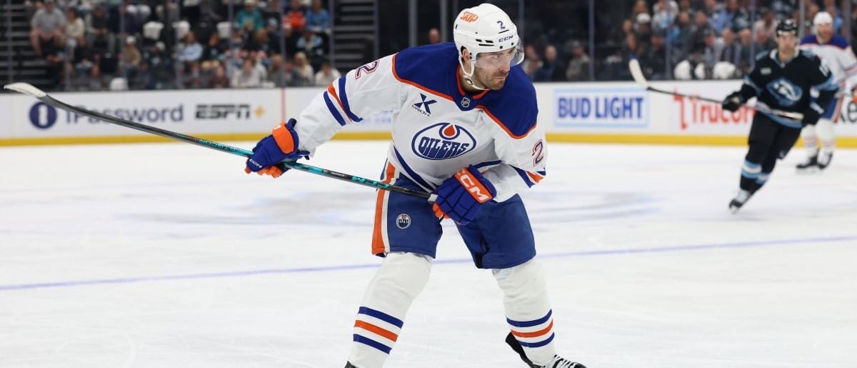 Edmonton Oilers defenseman Evan Bouchard (2) shoots against the Utah Mammoth during the second period at Delta Center