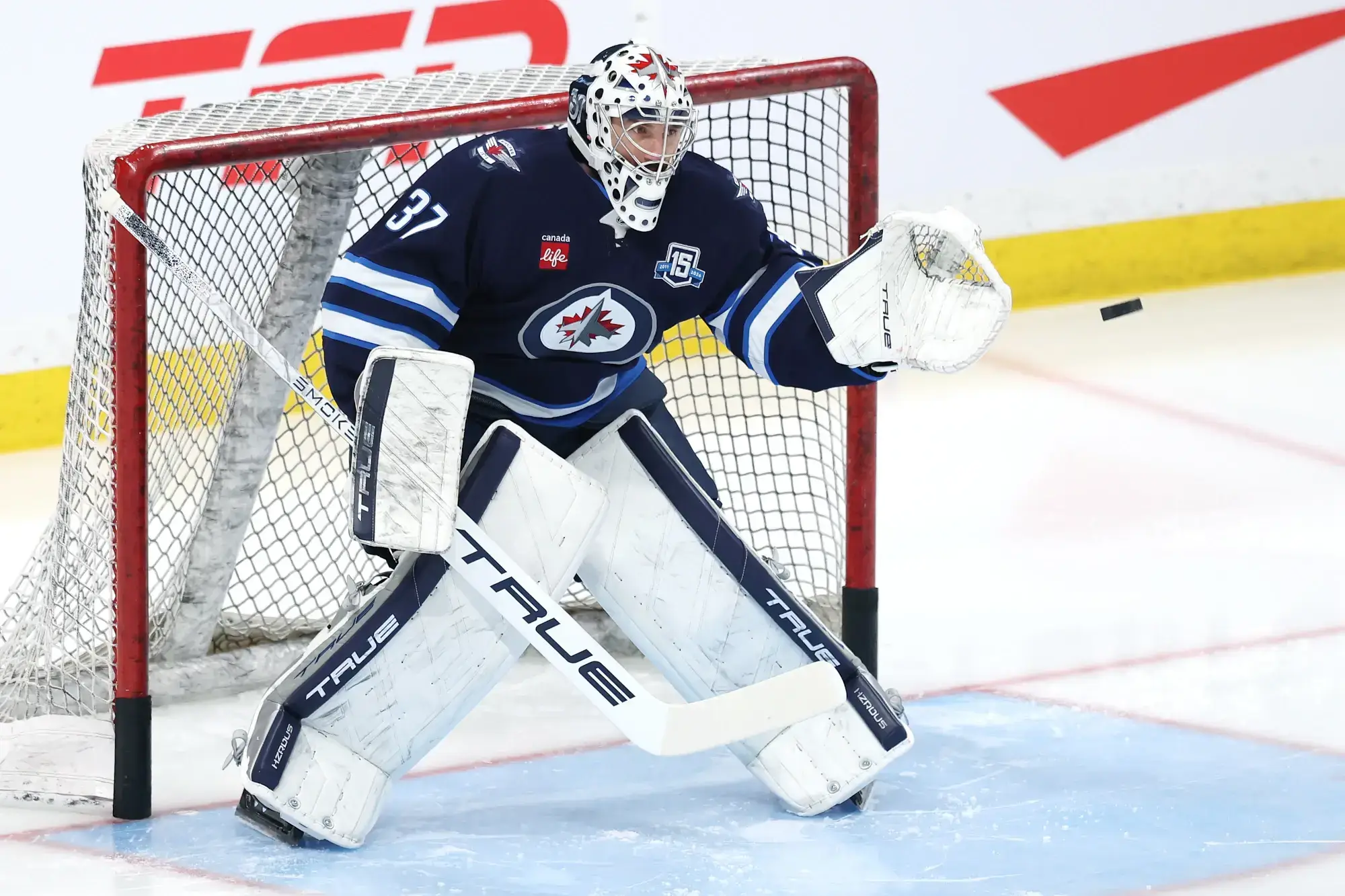 Feb 4, 2026; Winnipeg, Manitoba, CAN; Winnipeg Jets goaltender Connor Hellebuyck (37) warms up before a game against the Montreal Canadiens at Canada Life Centre.