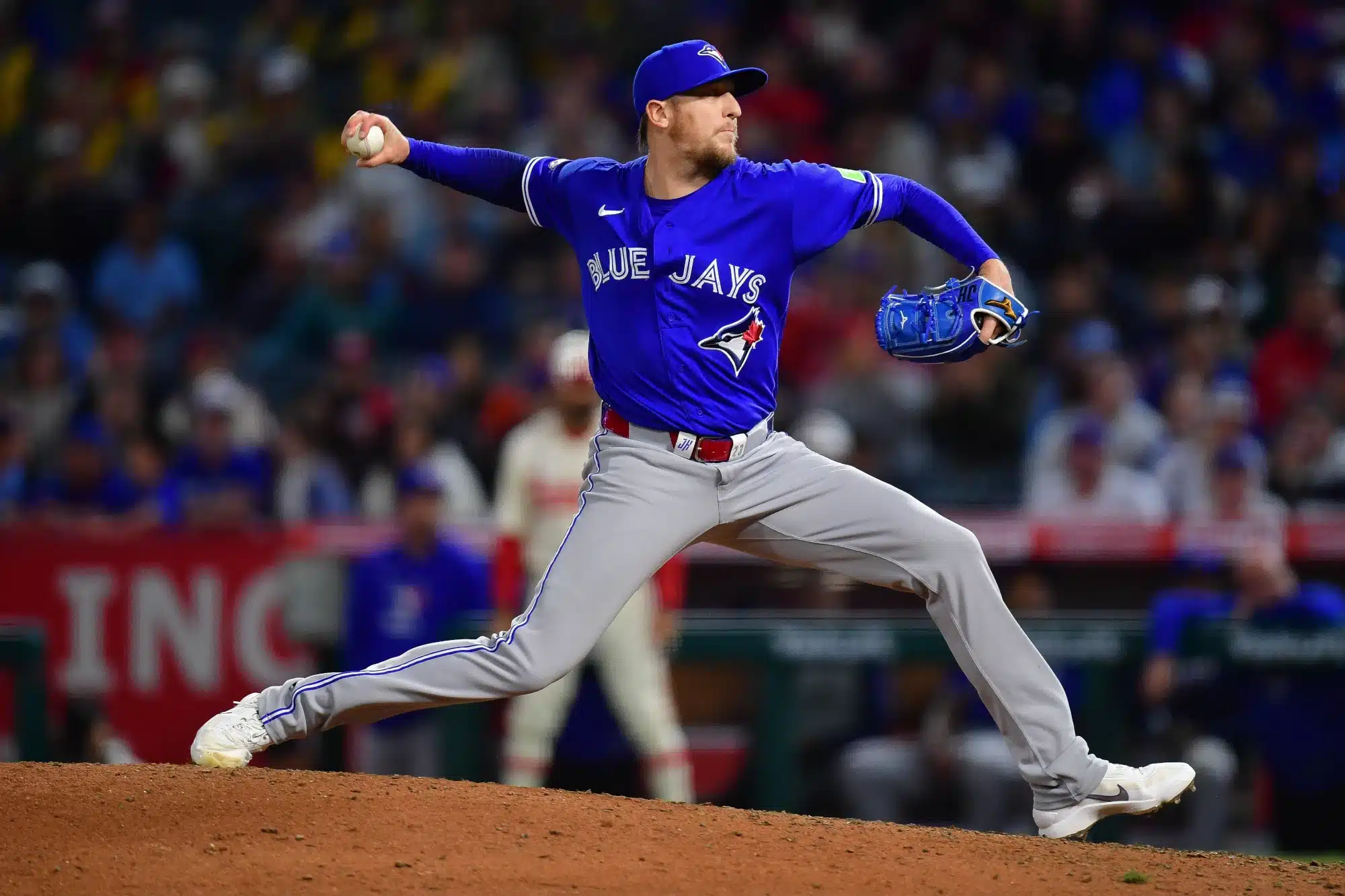 Apr 21, 2026; Anaheim, California, USA; Toronto Blue Jays pitcher Jeff Hoffman (23) throws against the Los Angeles Angels during the ninth inning at Angel Stadium. 