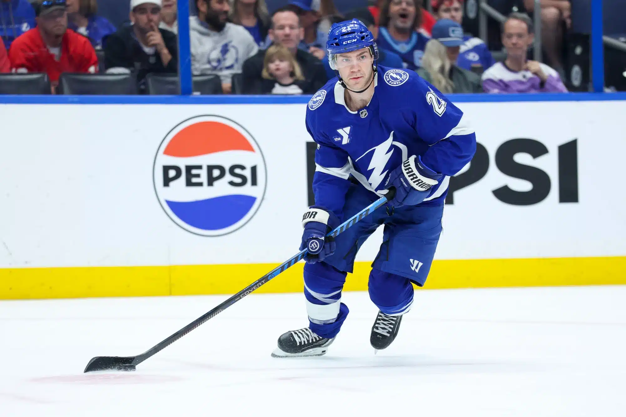 Mar 12, 2026; Tampa, Florida, USA; Tampa Bay Lightning center Brayden Point (21) controls the puck against the Detroit Red Wings in the first period at Benchmark International Arena.