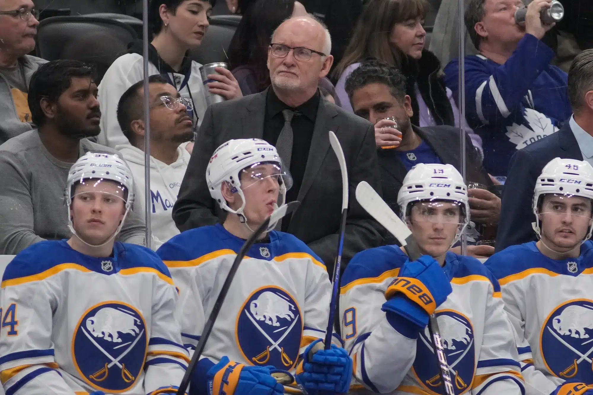Jan 27, 2026; Toronto, Ontario, CAN; Buffalo Sabres head coach Lindy Ruff (center) during a break in the action against the Toronto Maple Leafs at Scotiabank Arena. 