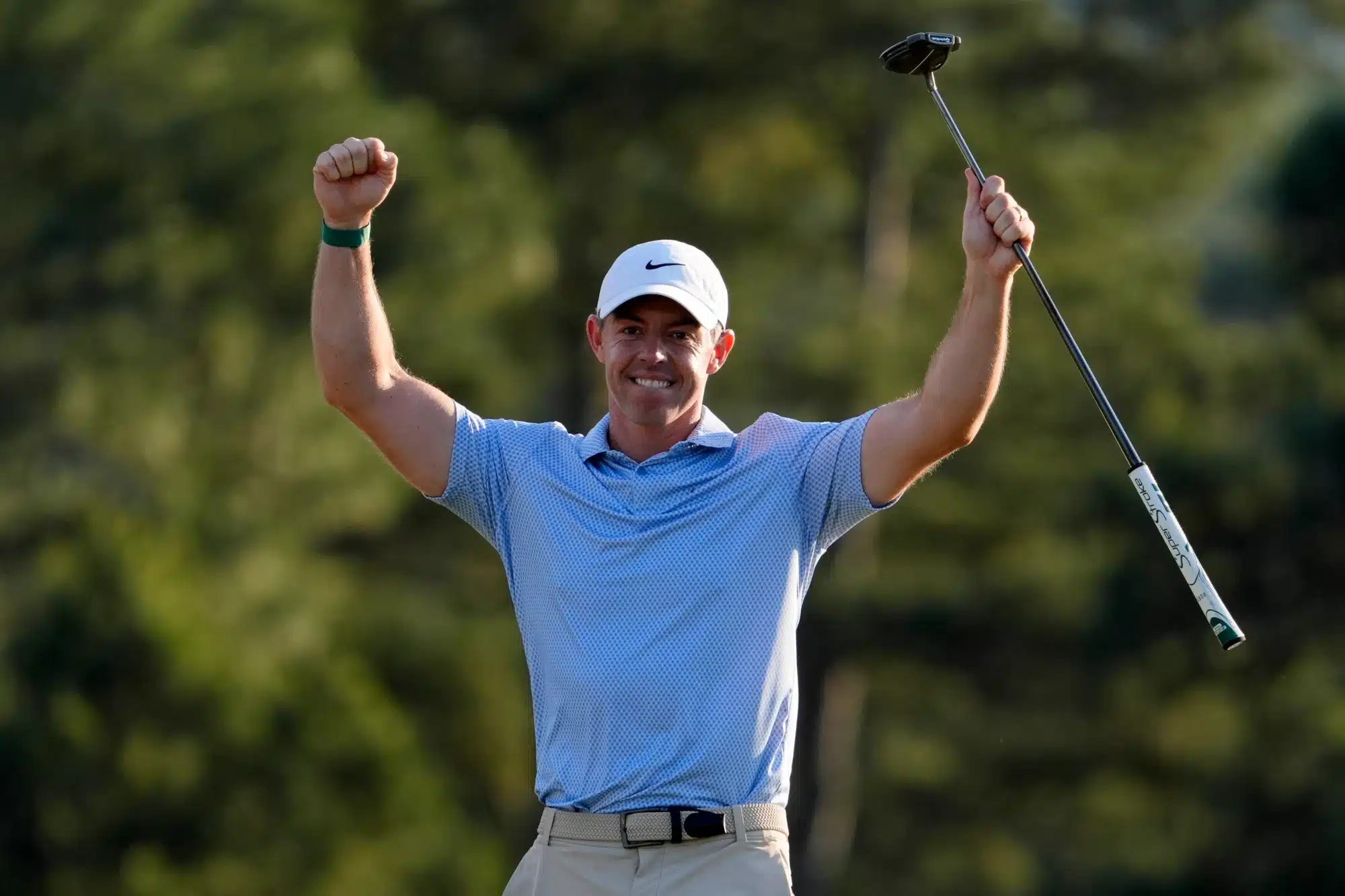 Apr 12, 2026; Augusta, Georgia, USA; Rory McIlroy reacts before putting in the ball on the 18th green during the final round of the Masters Tournament at Augusta National Golf Club. 