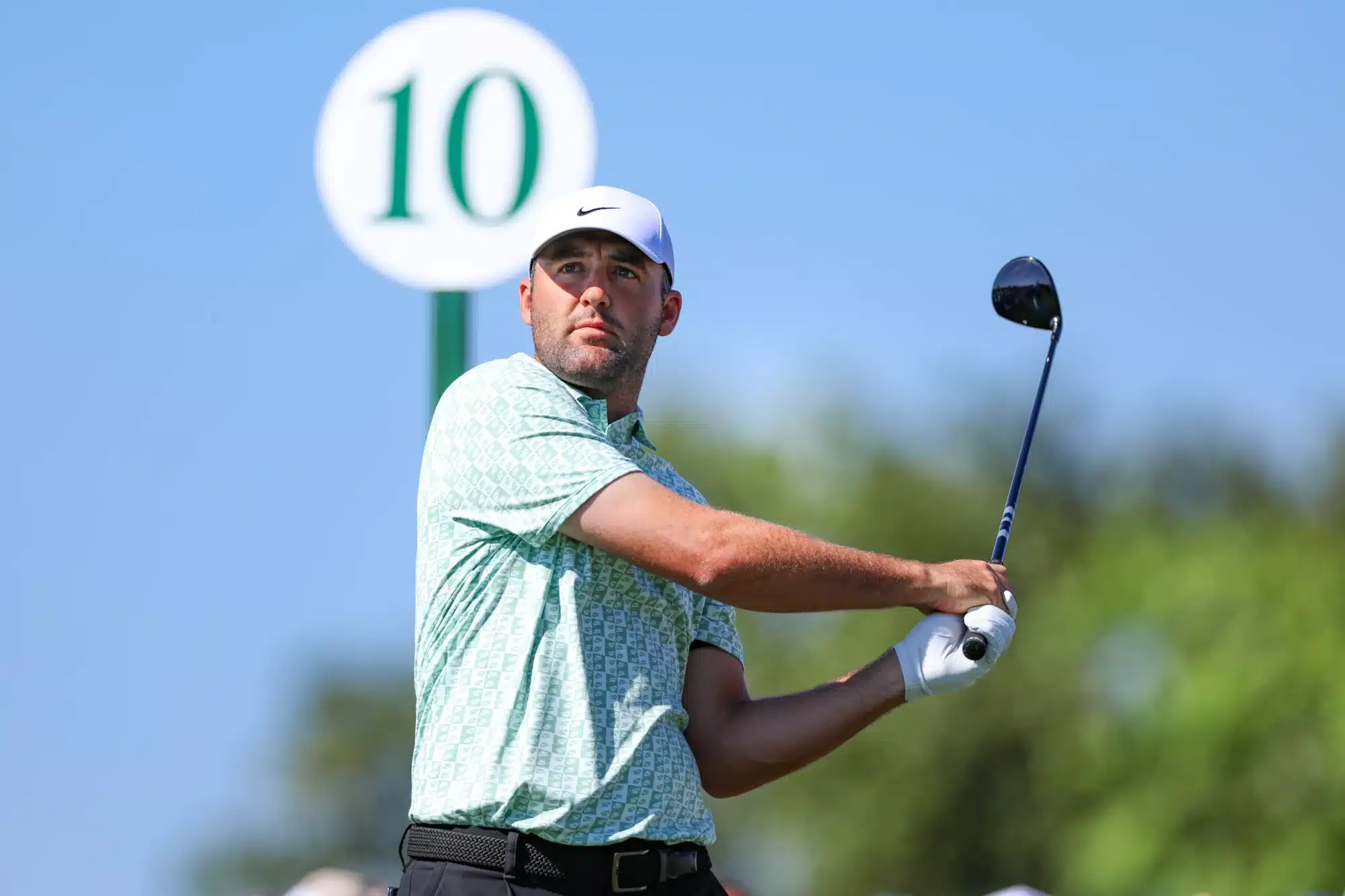 Apr 9, 2026; Augusta, Georgia, USA; Scottie Scheffler plays his shot from the tenth tee during the first round of the Masters Tournament at Augusta National Golf Club. 